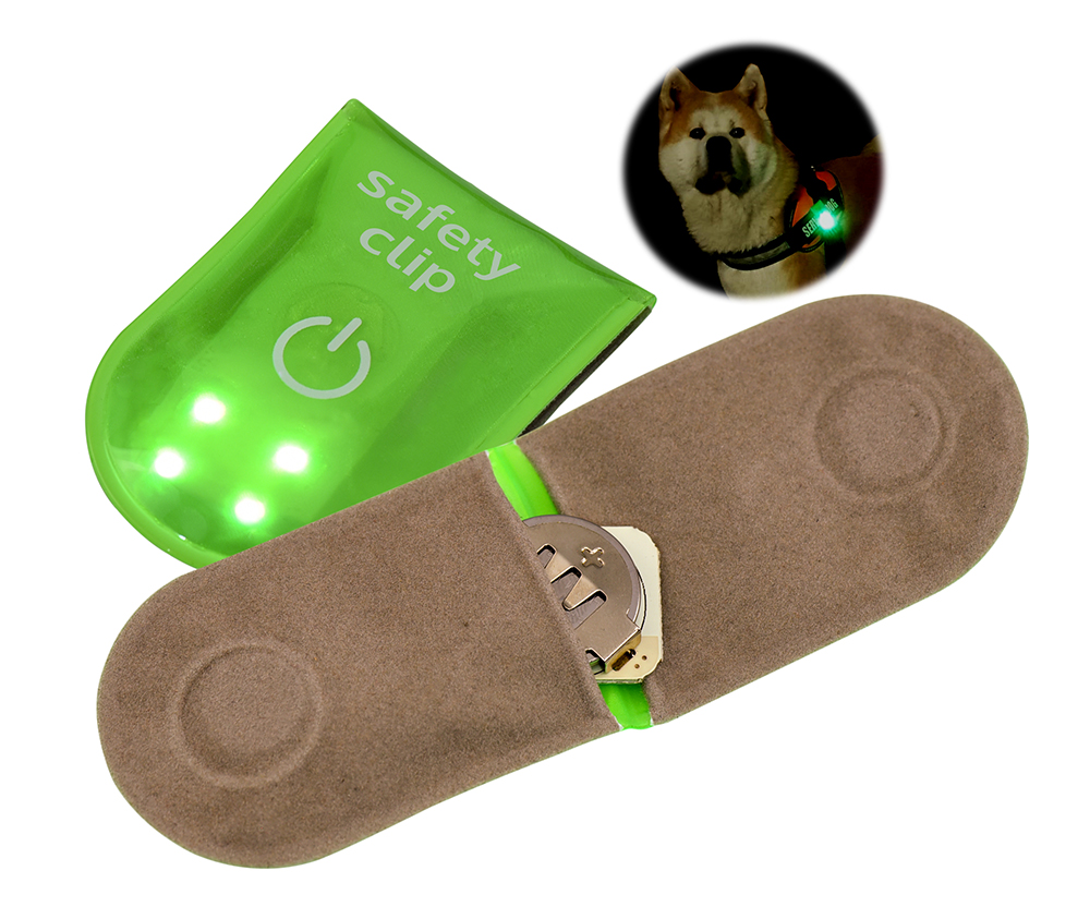 RF-021_reflektierender_Magnetclip_mit_Leuchtfunktionen_geschl_offen_Anw_Bsp_Hund_1A
